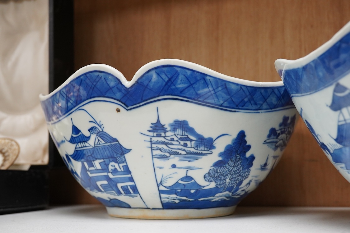 A pair of early 19th century Chinese blue and white bowls, 26cm in diameter